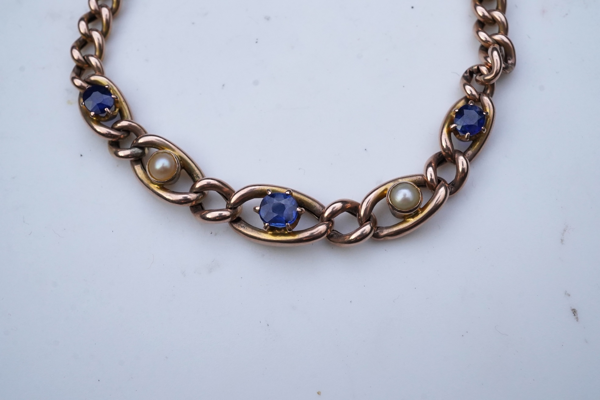 A late Victorian sapphire and pearl bracelet, circa 1900